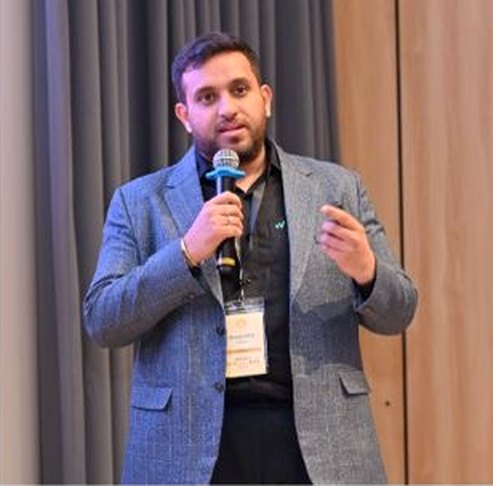 Speaker presenting to the Artha ecosystem