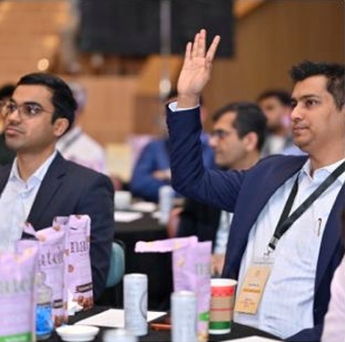 An attendee participating in a discussion